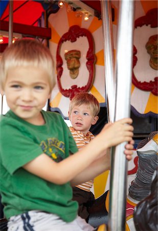 fair rides - Boys on Merry-go-Round, Ontario, Canada Stock Photo - Rights-Managed, Code: 700-03596234