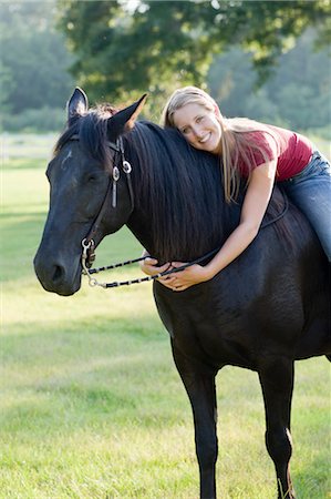 reiter (männlich und weiblich) - Teenage Girl-Reiten Stockbilder - Lizenzpflichtiges, Bildnummer: 700-03596306