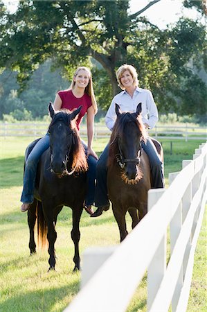 family, fence - Mother and Daughter Horseback Riding Stock Photo - Rights-Managed, Code: 700-03596302