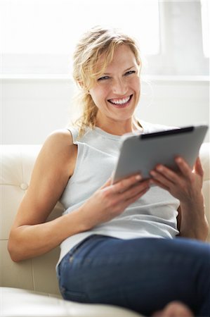 excited happy tablet - Woman Using iPad Stock Photo - Rights-Managed, Code: 700-03601468