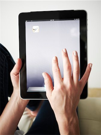Woman Using iPad Stock Photo - Rights-Managed, Code: 700-03601462