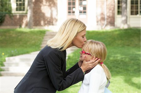 school kids mom - Mother Kissing Daughter in front of School Stock Photo - Rights-Managed, Code: 700-03601495