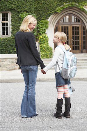 person in front of a door - Mother Taking Daughter to School Stock Photo - Rights-Managed, Code: 700-03601492