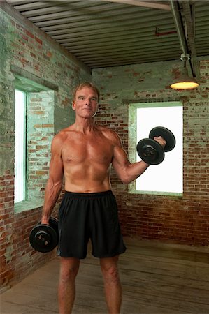 david mendelsohn - Senior Man Lifting Weights Foto de stock - Direito Controlado, Número: 700-03615785