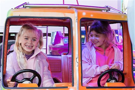 fair rides - Two Girls at Amusment Park, Bordeaux, Gironde, Aquitaine, France Stock Photo - Rights-Managed, Code: 700-03615854