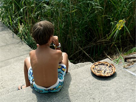 Little Boy With Cake, Province of La Spezia, Liguria, Italy Stock Photo - Rights-Managed, Code: 700-03615915