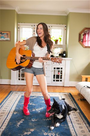 pet owner (female) - Woman Playing Guitar Stock Photo - Rights-Managed, Code: 700-03613018