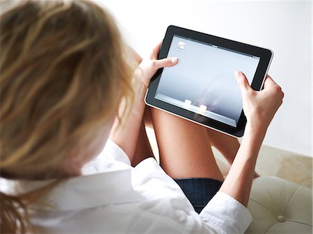 Woman Using iPad Stock Photo - Rights-Managed, Code: 700-03621217