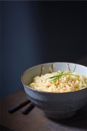 palillo (oriental) - Bowl of Lemon Saffron Rice Foto de stock - Con derechos protegidos, Código: 700-03622988