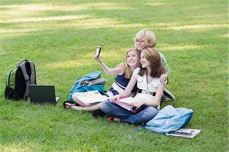 studying with phone - Group of Friends Sitting on Grass Stock Photo - Rights-Managed, Code: 700-03644527