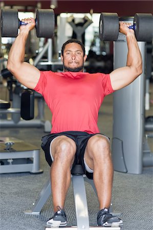 shoulder weight lifts - Man Lifting Weights in Gym Stock Photo - Rights-Managed, Code: 700-03644545