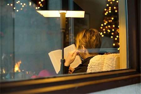 festive lights at night - Women Reading at Christmas Time Stock Photo - Rights-Managed, Code: 700-03659150