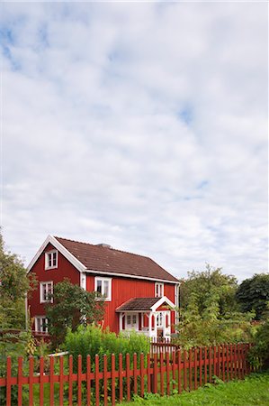 european cottage gardens - Red Wooden House and Fence, Bullerbue, Smaland, Sweden Stock Photo - Rights-Managed, Code: 700-03659288