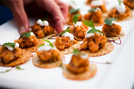 party dish - Arranging Appetizers on Platter Stock Photo - Rights-Managed, Code: 700-03665643