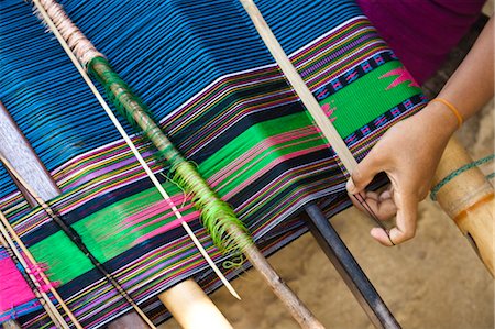 Woman Weaving Ikat Cloth, Sumba, Indonesia Stock Photo - Rights-Managed, Code: 700-03665840