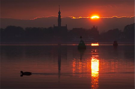 dawn red sky - Sunset Over Lake Veere, Veere, Zeeland, Netherlands Stock Photo - Rights-Managed, Code: 700-03685806