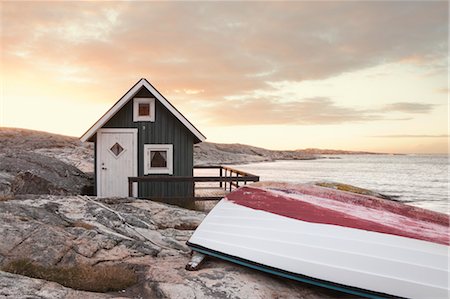 Hut on Shoreline at Surise, Bohuslaen, Vastra Gotaland County, Gotaland, Sweden Stock Photo - Rights-Managed, Code: 700-03685935