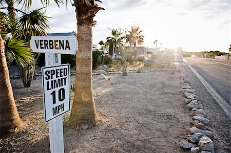 sunrise and roads - Speed Limit Traffic Sign in RV Park, Yuma, Arizona, USA Stock Photo - Rights-Managed, Code: 700-03686143