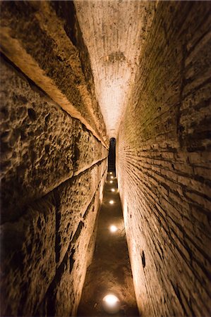 strange perspective - narrow Passageway, Basilica di San Clemente, Rome, Italy Stock Photo - Rights-Managed, Code: 700-03696778