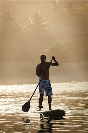 paddling - Paddleboard Surfer at Nihiwatu Resort, Sumba, Indonesia Stock Photo - Rights-Managed, Code: 700-03696900