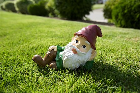 reclining - Gnome Relaxing on Lawn Stock Photo - Rights-Managed, Code: 700-03697935