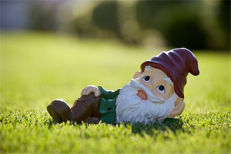 reclining figure - Gnome Relaxing on Lawn Stock Photo - Rights-Managed, Code: 700-03697940