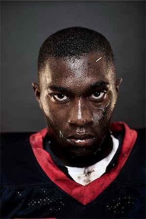 sport player portraits - Close-Up of Dirty, Sweaty Football Player Stock Photo - Rights-Managed, Code: 700-03698173