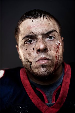 football players dirt - Close-Up of Football Player with Injuries Stock Photo - Rights-Managed, Code: 700-03698183