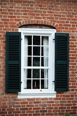 shutters - Candle in Window, Old Salem, North Carolina, USA Stock Photo - Rights-Managed, Code: 700-03698300