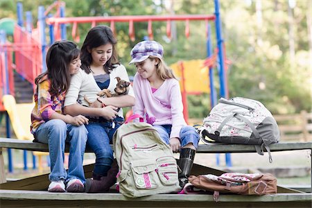 playground friends - Girls with Puppy at Park Stock Photo - Rights-Managed, Code: 700-03719296