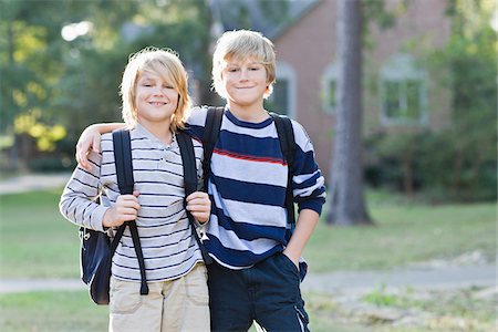 Brothers Going to School Foto de stock - Con derechos protegidos, Código: 700-03719316