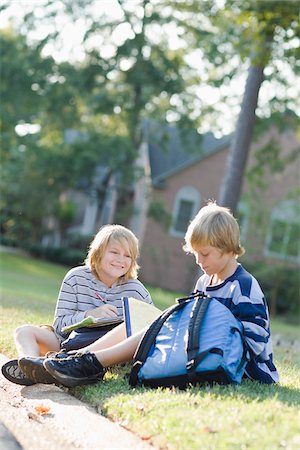 family backpack - Brothers Sitting on Grass with Homework Stock Photo - Rights-Managed, Code: 700-03719317