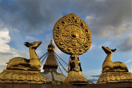Wheel of Dharma and Stupa in Boudhanath, Bagmati Zone, Madhyamanchal, Nepal Stock Photo - Rights-Managed, Code: 700-03737496