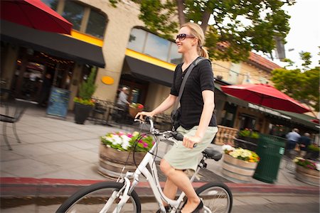 storefront - Woman Riding Bicycle, San Diego, California Stock Photo - Rights-Managed, Code: 700-03738497