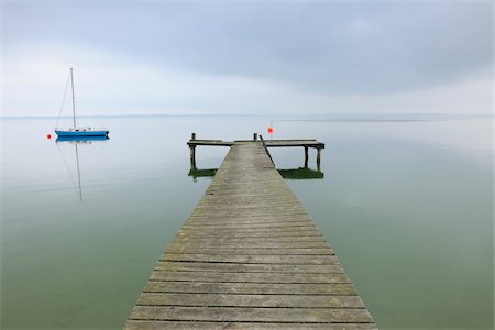 Sailboat and Dock, Lake Chiemsee, Bavaria, Germany Stock Photo - Rights-Managed, Code: 700-03738995