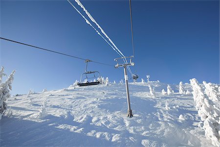 skiers and chairs lifts in snow - Chair Lift at Ski Resort Stock Photo - Rights-Managed, Code: 700-03739359