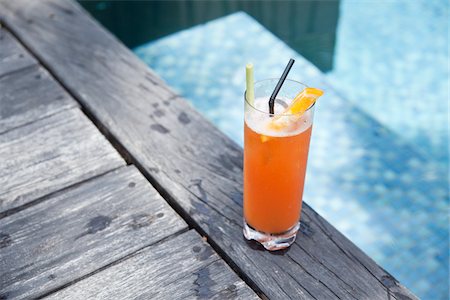 drinks by the pool - Tropical Drink by Pool Stock Photo - Rights-Managed, Code: 700-03739474