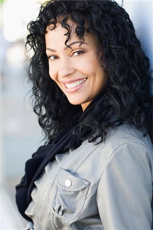 Portrait of Woman with Curly Hair Stock Photo - Rights-Managed, Code: 700-03762687