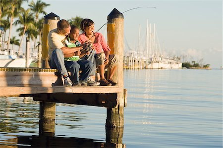 father and son biracial - Family Fishing from Pier Stock Photo - Rights-Managed, Code: 700-03762728