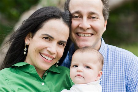 portrait happy latin father mother child - Close-Up of Mother, Father and Baby Girl Stock Photo - Rights-Managed, Code: 700-03762743