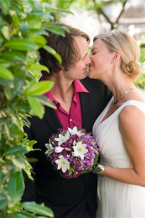 romantic wedding flower - Newlywed Couple Kissing Stock Photo - Rights-Managed, Code: 700-03777761