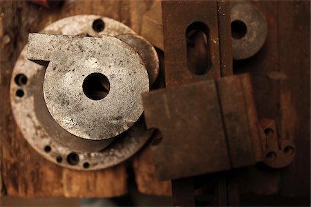 Close-Up of Metal Parts in Abandoned Locksmith Factory Stock Photo - Rights-Managed, Code: 700-03777876