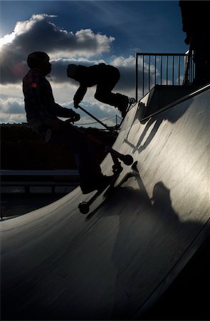 silhouette teen boy not woman not man not girl - Teenagers on Scooters at Skatepark, Paris, France Stock Photo - Rights-Managed, Code: 700-03777893