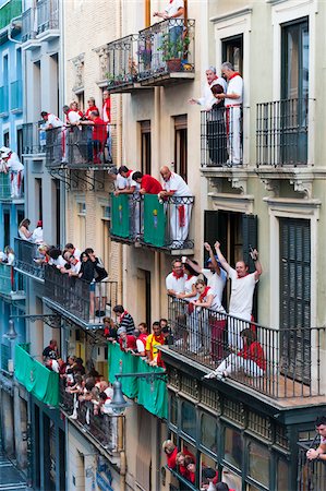 Spectators at Running of the Bulls, Fiesta de San Fermin, Pamplona, Navarre, Spain Stock Photo - Rights-Managed, Code: 700-03805428