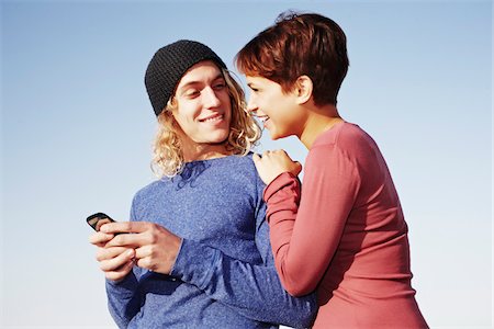 Couple avec téléphone portable Photographie de stock - Rights-Managed, Code: 700-03814404