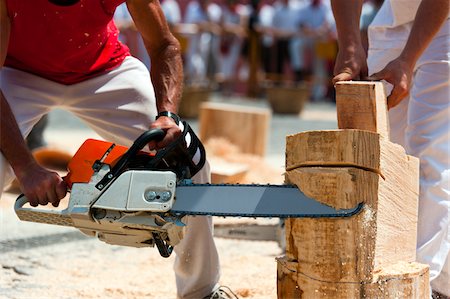 simsearch:700-03805441,k - Men Competing in Rural Sports, Plaza de Los Fueros, Fiesta de San Fermin, Pamplona, Navarre, Spain Stock Photo - Rights-Managed, Code: 700-03814420