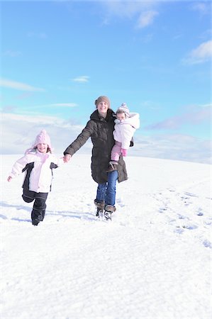 photos of family playing in snow - Mother and Daughters Outdoors in Winter Stock Photo - Rights-Managed, Code: 700-03814449
