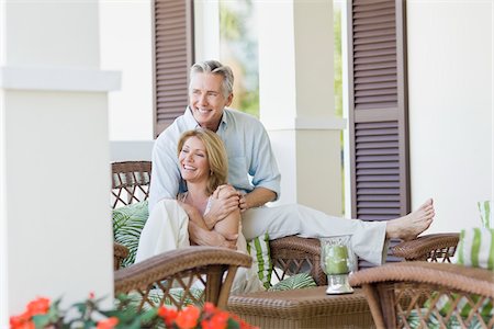 simsearch:700-06752635,k - Couple Sitting on Patio Stock Photo - Rights-Managed, Code: 700-03814468