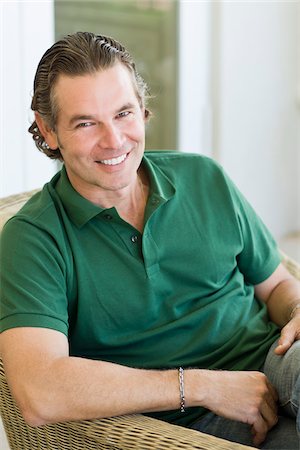 person in white polo shirt - Portrait of Man Stock Photo - Rights-Managed, Code: 700-03814699