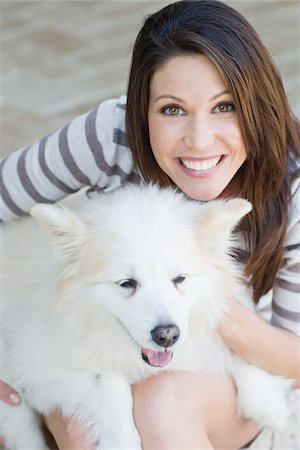 dog eyes - Portrait de femme avec chien Photographie de stock - Rights-Managed, Code: 700-03814706